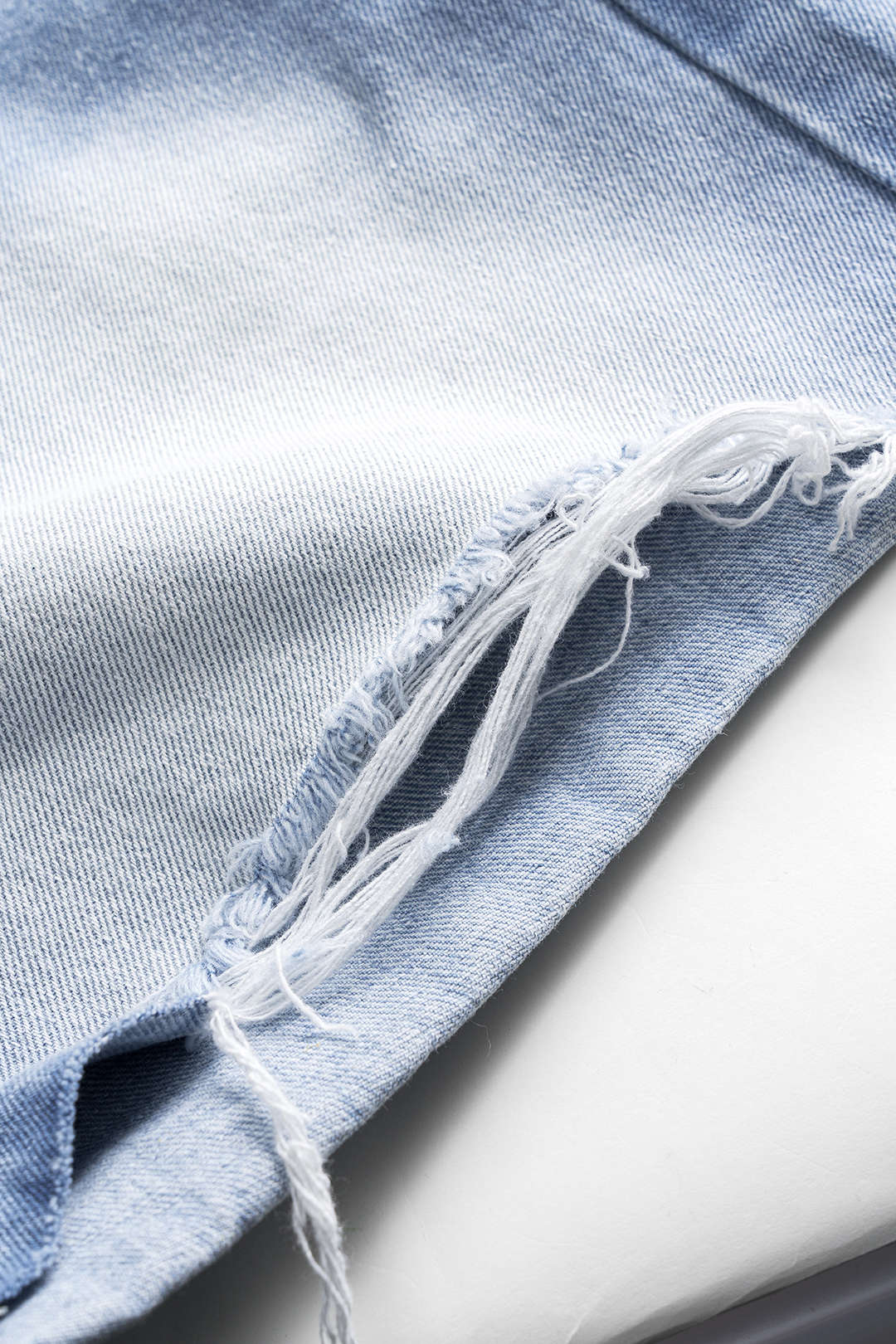 Denim Asymmetrical Button Pocket Ripped Shorts
